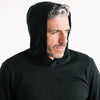 Batch Men's Essential T-Hoodie – Black Cotton Jersey Image Hood Close Up On Head