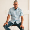 Batch Men's Editor Short Sleeve Utility Shirt – Clean Blue Mercerized Cotton Image on Body Sitting