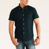 Batch Men's Essential Short Sleeve Casual Shirt - WB Navy Stretch Cotton Poplin Image Standing with Watch on Wrist