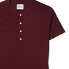 Batch Men's Burgundy Short Sleeve Henley With White Buttons Close-Up Image