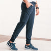 Batch Men's Essential Joggers – Navy Cotton French Terry Image Side with Hand in Pocket