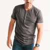 Batch Men's Essential Short Sleeve Curved Hem Henley – Slate Gray Cotton Jersey Image Standing on Body