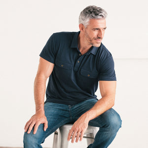 Batch Men's Constructor Short Sleeve Polo Shirt – Navy Cotton Jersey Image On Body Sitting