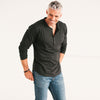 Batch Men's Essential Curved Hem Henley – Black Cotton Jersey Image On Body with Hands in Pockets