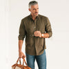 Batch Men's Essential Casual Shirt - Fatigue Green Cotton Twill Image On Body Holding Sunglasses