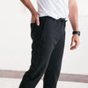 Batch Men's Essential Joggers – Black Cotton French Terry Image Side with Hand in Pocket